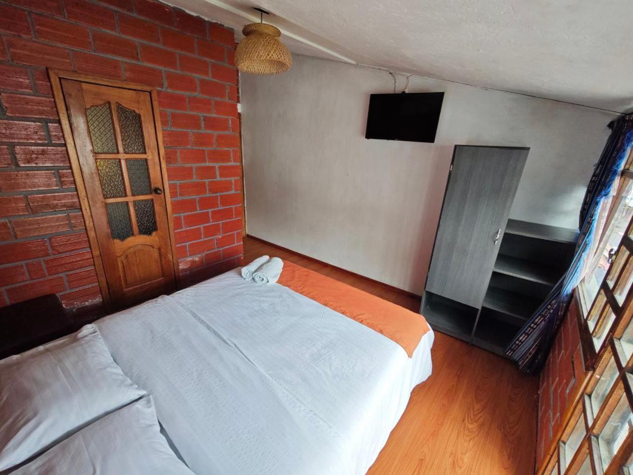 Garden House Hostal Banos  Ngoại thất bức ảnh